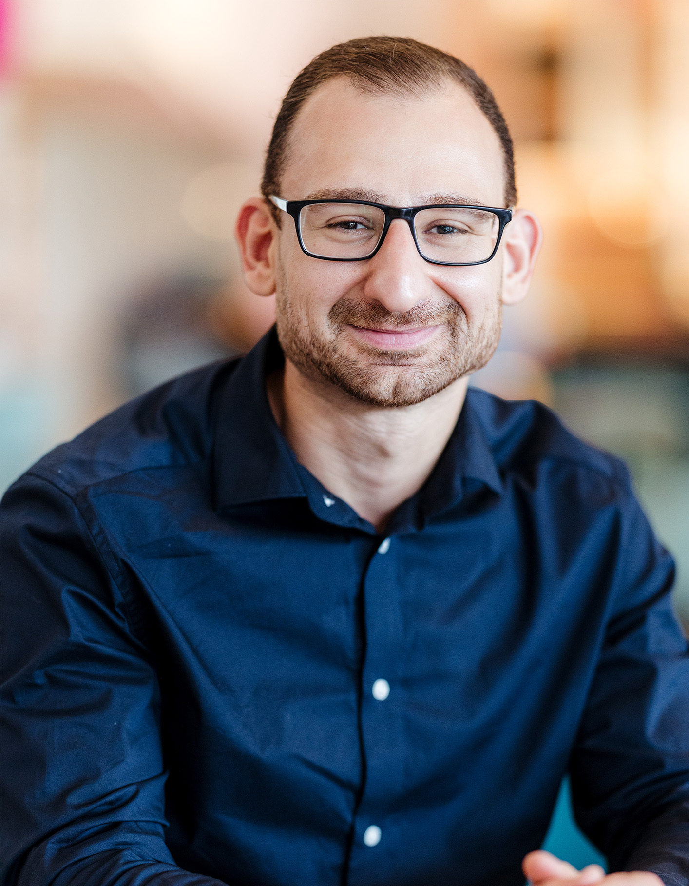 Portretfoto Dimpact medewerker Caner - product integratie specialist