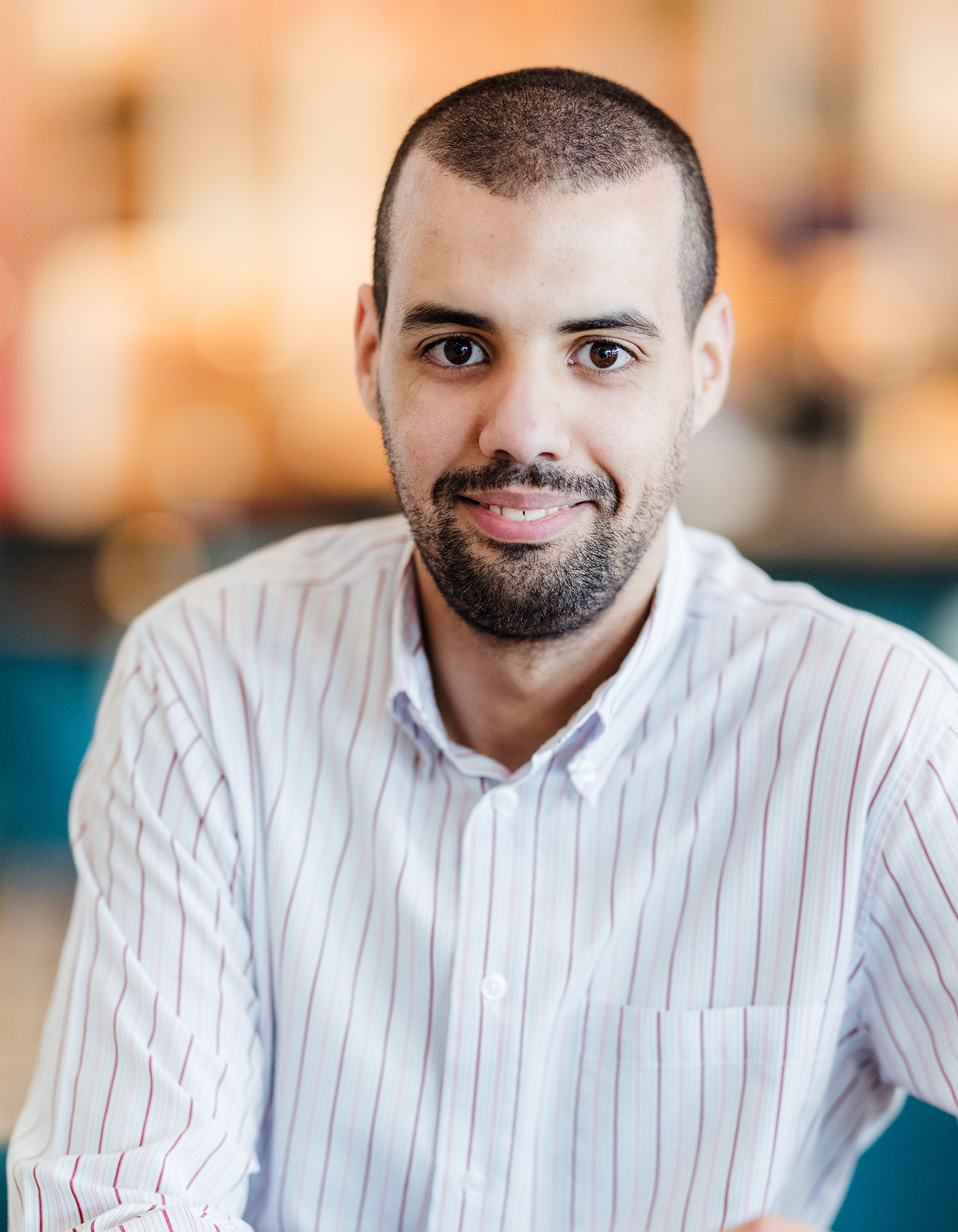 Portretfoto Dimpact medewerker Soufian - product beheerder